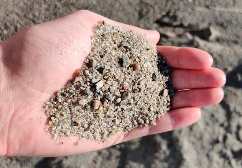 En håndfuld vasket sand